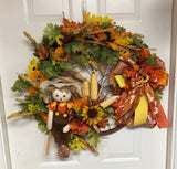 Fall Scarecrow Bicycle Wheel Wreath