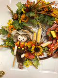 Fall Scarecrow Bicycle Wheel Wreath