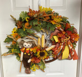 Fall Scarecrow Bicycle Wheel Wreath