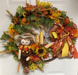 Fall Scarecrow Bicycle Wheel Wreath